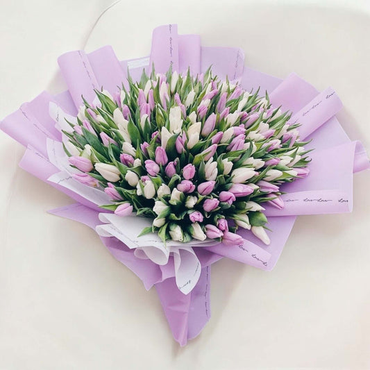 Large bouquet of 130 fresh purple and white tulips for flower delivery in Los Angeles