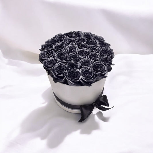 Elegant black rose bouquet in a stylish box, perfect for same day flower delivery. Order online for fresh flowers with free shipping and local florist service.