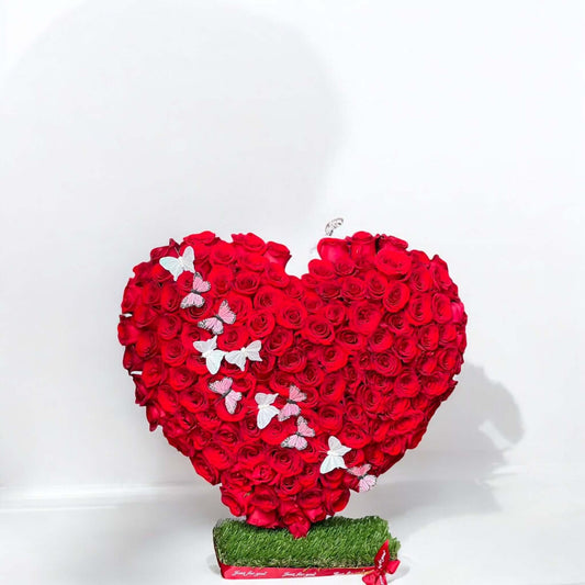 Heart-shaped bouquet of red roses with same day flower delivery near you