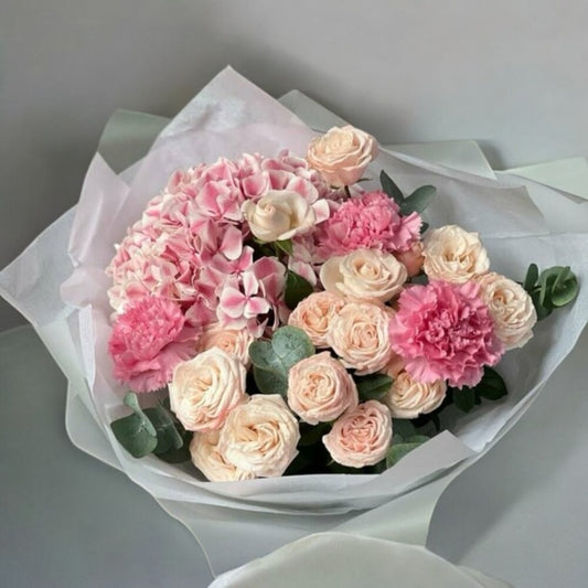 Elegant bouquet with hydrangeas and spray roses, available for same day flower delivery near you with free shipping from a trusted local florist