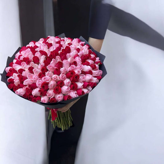 Bouquet of pink and red roses with same day flower delivery near you