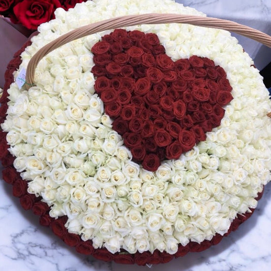 Large basket of red and white roses with fast same day flower delivery in LA