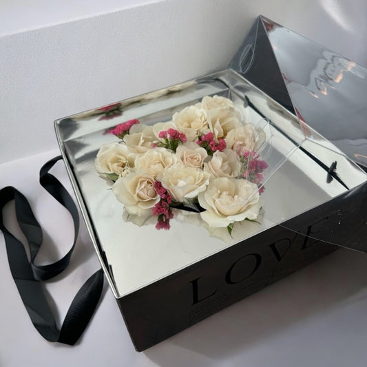 Small rose bouquet in a decorative box, perfect for gift delivery. Fresh flowers, same day and next day flower delivery, local florist service with free shipping.