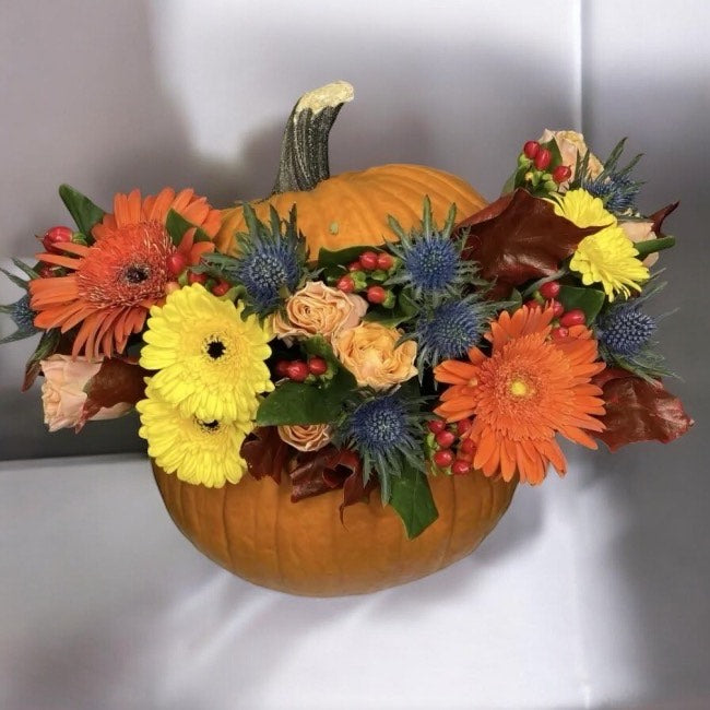 Flowers in a Pumpkin: A Beautiful Arrangement