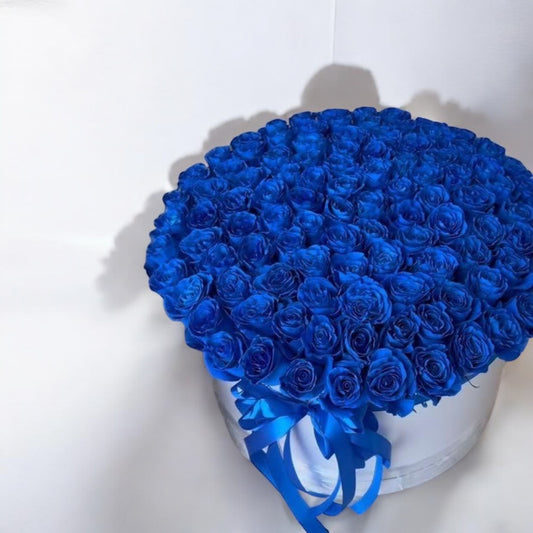 100 Blue roses in a box